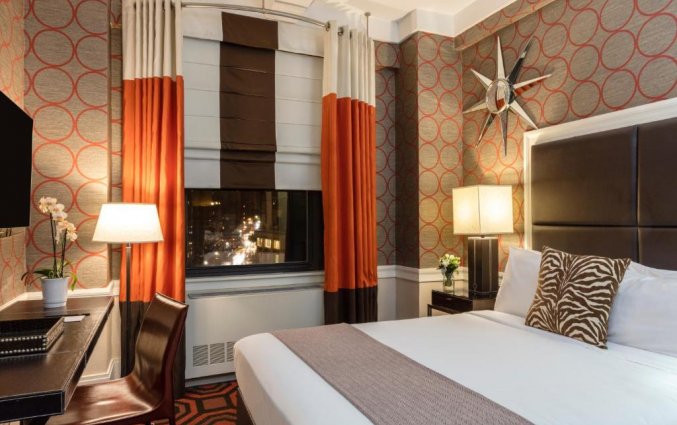 Slaapkamer van hotel The Empire in Manhattan New York